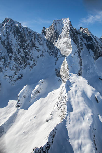 Aerial view of Spigolo Badile in winter. Val Bondasca, Val Bregaglia, Canton of Grisons Switzerland Europe