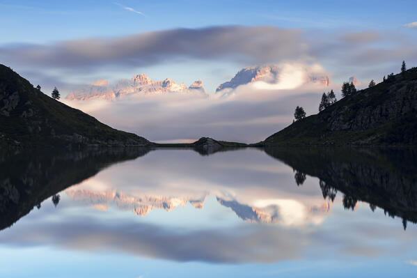 Lake Ritorto and Brenta Dolomites peaks at sunset, Madonna di Campiglio, Trento province, Trentino-Alto Adige, Italy