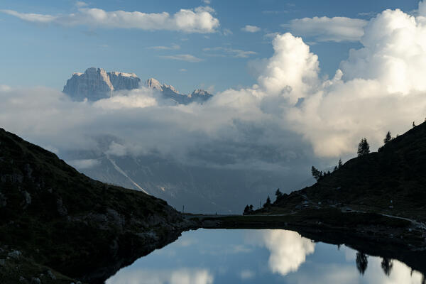 Brenta Dolomites reflected in pristine water of Lake Ritorto, Madonna di Campiglio, Trento province, Trentino-Alto Adige, Italy