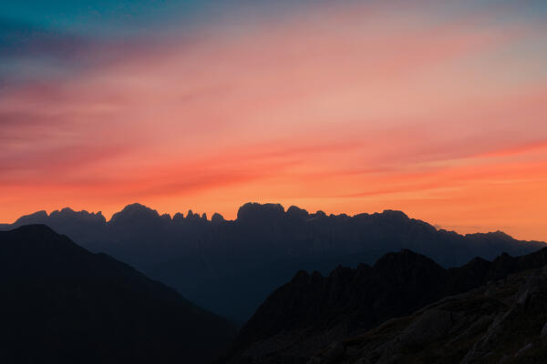 Sunrise over Brenta Dolomites view from Lago Nero di Cornisello, Adamello Brenta Nature Park, Trento, Trentino-Alto Adige, Italy