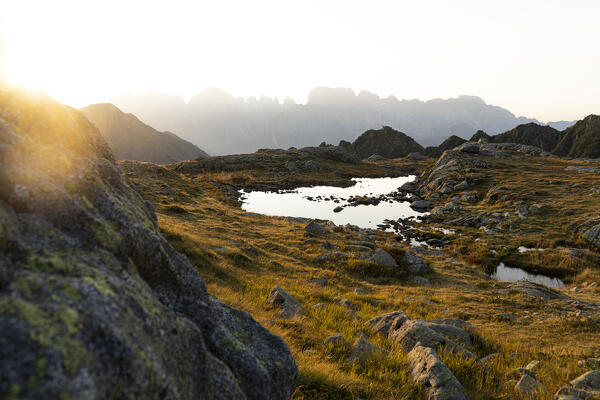 Foggy sunrise over Brenta Dolomites view from Rifugio Cornisello, Adamello Brenta Nature Park, Trentino-Alto Adige, Italy