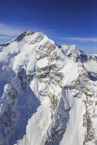 Aerial view of Piz Bernina in winter. Engadine, Canton of  Grisons, Switzerland Europe