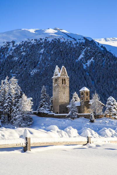 The church of San Gian in winter. Celerina, Engadine, Canton of Grisons, Switzerland Europe