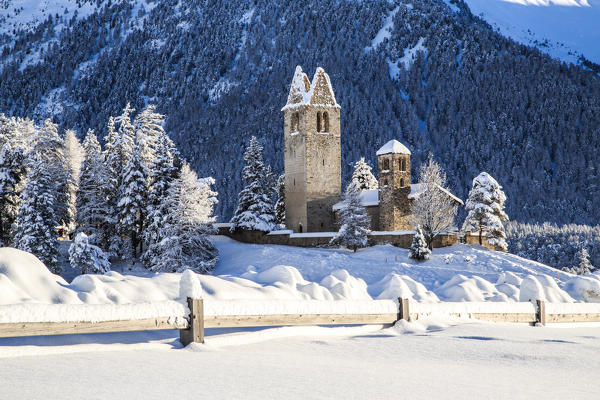 The church of San Gian in winter. Celerina, Engadine, Canton of Grisons, Switzerland Europe