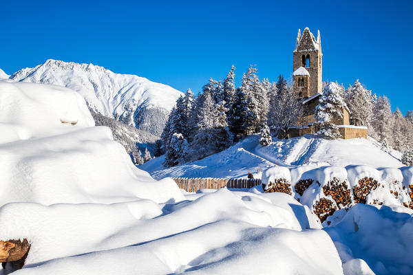 The church of San Gian in winter, Celerina, Engadine, Canton of Grisons Switzerland Europe