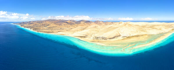 Aerial view of white sand beach of Costa Calma by the clear ocean, Jandia Nature Park, Fuerteventura, Canary Islands, Spain
