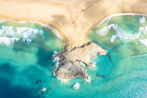 Aerial view of El Islote and Cofete Beach washed by ocean waves, Jandia, Fuerteventura, Canary Islands, Spain