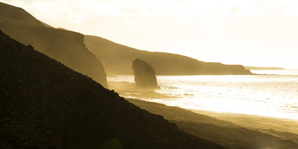 Roque Del Moro geological landmark at sunset, Cofete beach, Jandia natural park, Fuerteventura, Canary Islands, Spain