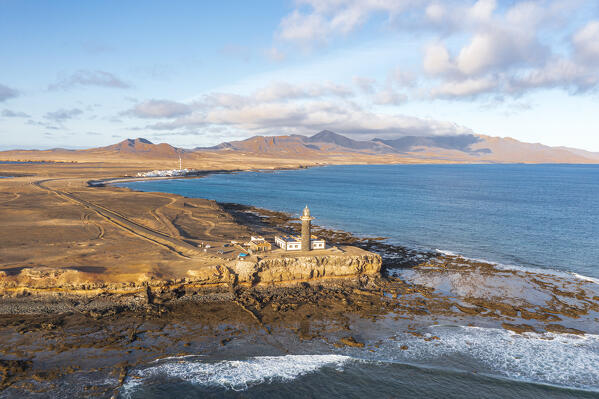 Aerial view of Punta Jandia lighthouse (Faro de la Lola) on cliffs above the ocean, Fuerteventura, Canary Islands, Spain