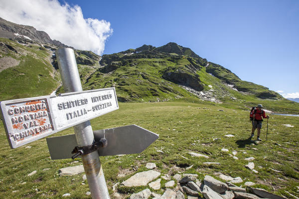 Road signs on the border between Italy and Switzerland at Pass of Baldiscio, Campodolcino, Vallespluga, Valchiavenna, Lombardy, Italy Europe