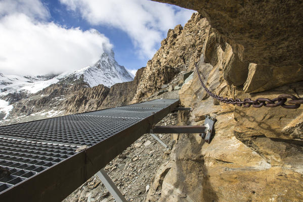 Iron runway on the track that takes to Hornli-hutte. Zermatt, Valais, Switzerland Europe