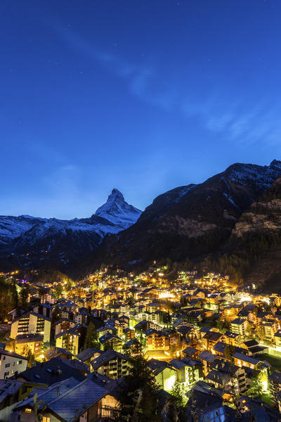 View of Zermat at dusk with Matterhorn in the background. Canton of Valais, Switzerland Europe