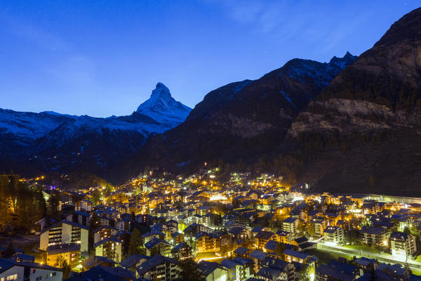 View of Zermat at dusk with Matterhorn in the background. Canton of Valais, Switzerland Europe