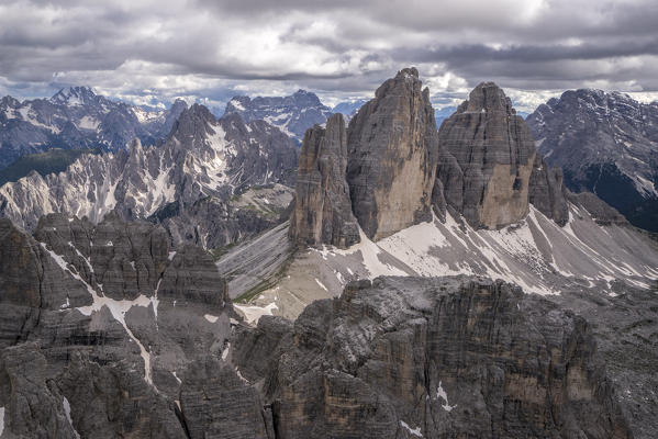 Aerial view of the Three Peaks of Lavaredo on a cloudy day. Dolomites. Cadore. Veneto. Italy. Europe