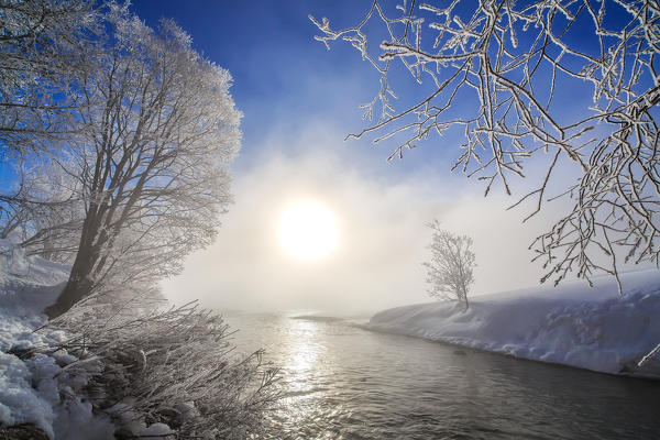 Snow and frost on the banks of the River Inn. Sils. Engadine. Switzerland. Europe