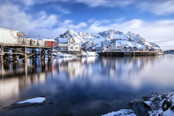 Clouds run over Henningsvaer fjord. Lofoten Islands. Norway. Europe