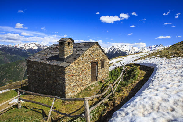 Stone hut used as a shelter for shepherds at the top of Rosetta. Rasura. Valgerola. Valtellina. Lombardy. Italy. Europe
