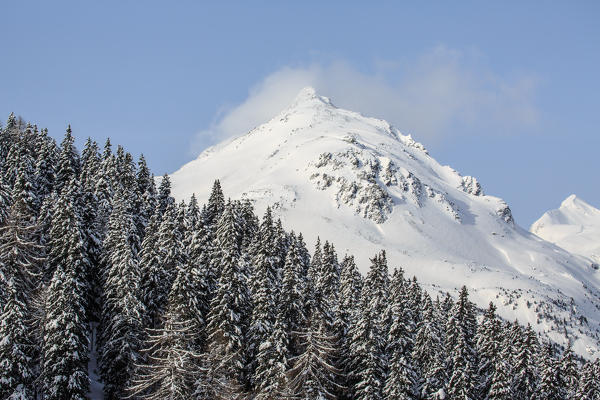 View of Lunghin Peak from Maloja Pass after an abundant snowfall. Canton of Graubunden. Maloja Pass. Engadine. Switzerland. Europe