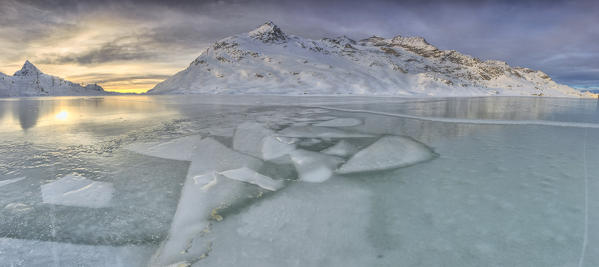 Mosaic of ice at Lake Bianco. Bernina Pass. Canton of Graubunden. Engadine. Switzerland. Europe