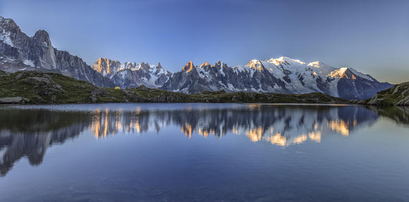 Sunrise over  Lac de Cheserys. In the background the range of Mont Blanc. Haute Savoie. France