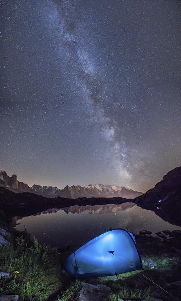 Camping under the stars at Lac de Cheserys. In the background the range of Mont Blanc. Haute Savoie. France