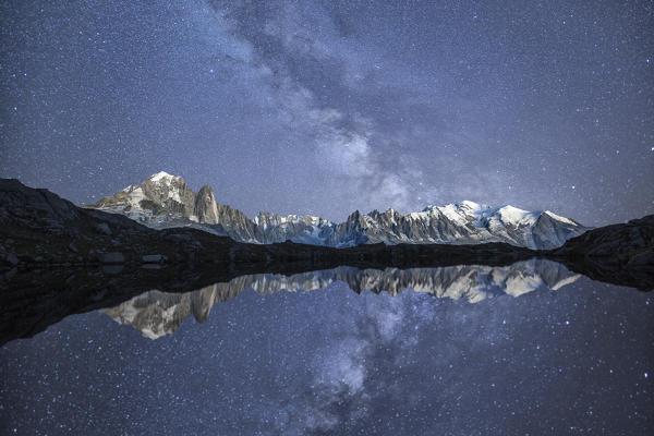 Starry sky over Mont Blanc range seen from Lac de Chesery. Haute Savoie. France Europe