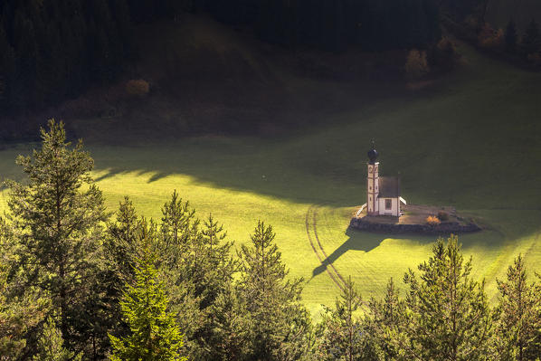 Autumn view of Church of San Giovanni in Ranui. Val di Funes. South Tyrol. Dolomites. Italy