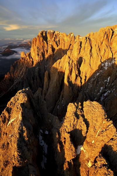 Aerial shot of Sassolungo and Sassopiatto at sunset. Sella Group Val Gardena. Dolomites Trentino Alto Adige Italy Europe