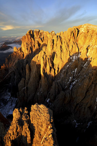 Aerial shot of Sassolungo and Sassopiatto at sunset. Sella Group Val Gardena. Dolomites Trentino Alto Adige Italy Europe