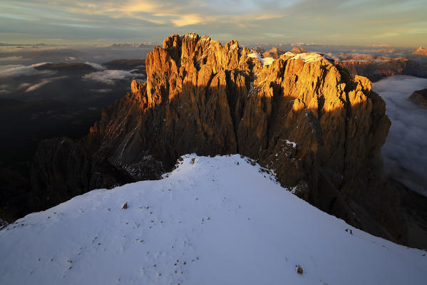 Aerial shot of Sassolungo and Sassopiatto at sunset. Sella Group Val Gardena. Dolomites Trentino Alto Adige Italy Europe