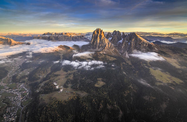 Aerial shot of Sassolungo and Sassopiatto at sunset. Sella Group Val Gardena. Dolomites Trentino Alto Adige Italy Europe