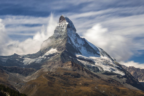 Matterhorn surrounded by clouds.  Zermatt Canton of Valais Pennine Alps Switzerland Europe