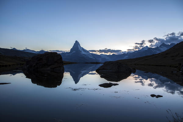 The Matterhorn reflected in Stellisee at sunset. Zermatt Canton of Valais Pennine Alps Switzerland Europe