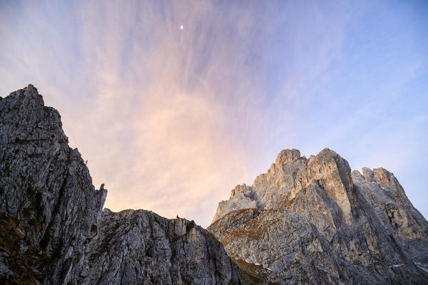 Pink sky at dawn on the peaks of Forcella De Furcia. Funes Valley South Tyrol Dolomites Italy Europe