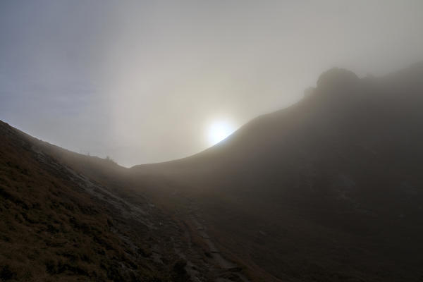 Foggy sunnrise. Forcella De Furcia. Funes Valley South Tyrol Dolomites Italy Europe