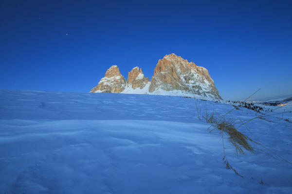 The blue dusk on Sassopiatto and Sassolungo. Dolomites. Fassa valley Sella Pass Trentino Alto Adige Italy Europe
