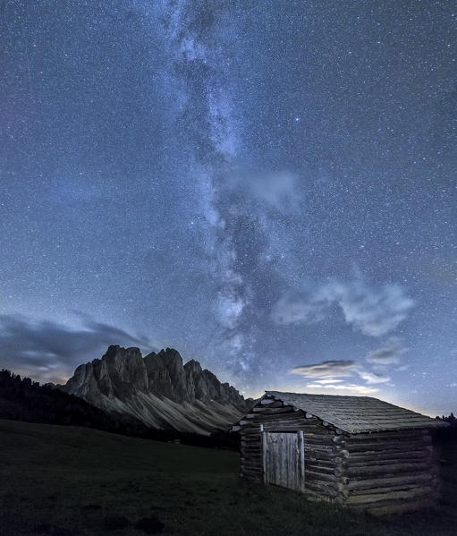The Milky Way in the  starry sky above the Odle. Funes Valley South Tyrol Dolomites Italy Europe