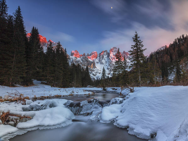 Winter sunset illuminates the  high peaks. Venagia Valley Panaveggio Natural Park Dolomites Trentino Alto Adige Italy Europe