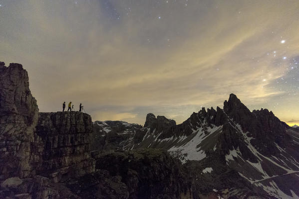 Photographers in action near the Three Peaks of Lavaredo at night. Sesto Dolomites Trentino Alto Adige Italy Europe