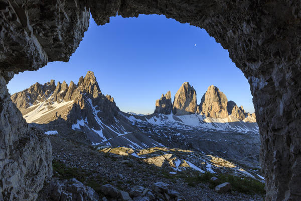 The Three Peaks of Lavaredo seen from a cave. Sesto Dolomites Trentino Alto Adige Italy Europe