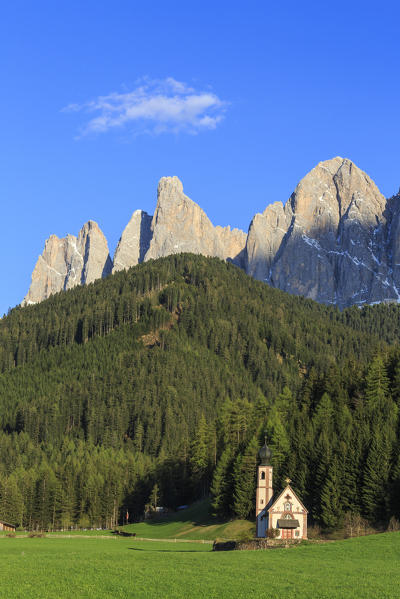 The Church of Ranui and the Odle group in the background. St. Magdalena Funes Valley Dolomites South Tyrol Italy Europe