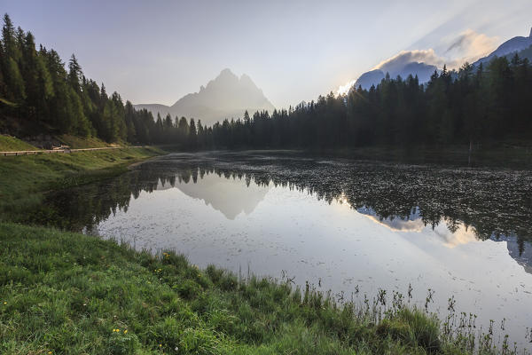 The Three Peaks of Lavaredo are reflected in Lake Antorno at sunrise. Veneto Sesto Dolomites Italy Europe