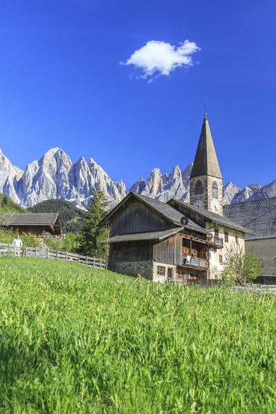 The Church of Ranui and the Odle group in the background. St. Magdalena Funes Valley Dolomites South Tyrol Italy Europe