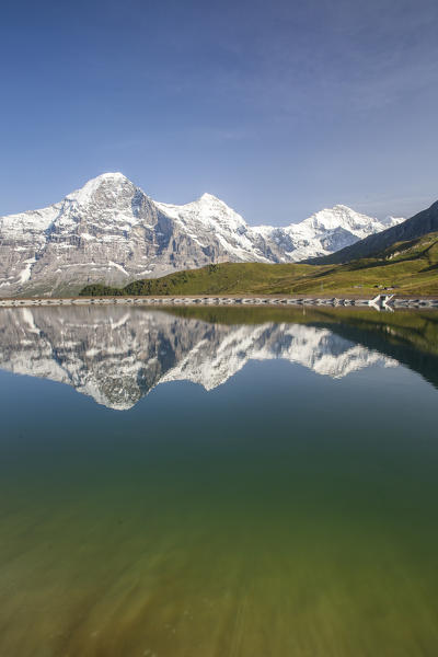 Mount Eiger reflected in clear waters of a lake Mannlichen Grindelwald Bernese Oberland Canton Bern Switzerland Europe