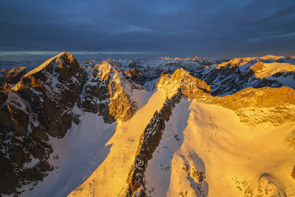 Aerial view of peaks Gemelli and Cengalo at sunset Masino Valley Valtellina Lombardy Italy Europe