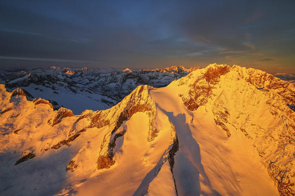 Aerial view of Mount Disgrazia at sunset Masino Valley Valtellina Lombardy Italy Europe