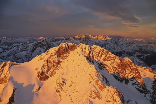 Aerial view of Mount Disgrazia and Bernina at sunset Masino Valley Valtellina Lombardy Italy Europe