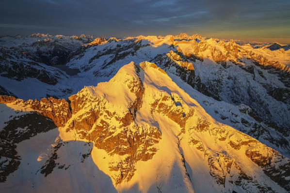 Aerial view of peaks Ferro at sunset Masino Valley Valtellina Lombardy Italy Europe