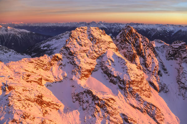 Aerial view of Corni Bruciati at sunset Masino Valley Valtellina Lombardy Italy Europe