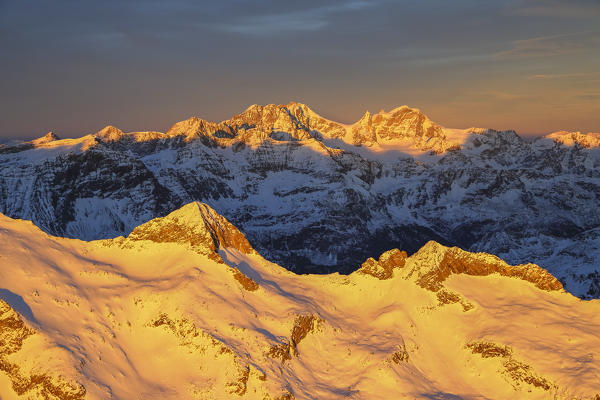 Aerial view of peak Baroni and Bernina Group at sunset Masino Valley Valtellina Lombardy Italy Europe